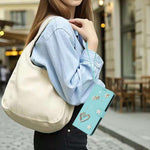 ZS01 Double-Layer Heart Floral Vegan Leather Phone Case with Wrist Strap, For iPhone 17e / 16e, For iPhone 17 Pro Max, For iPhone 17 Pro, For iPhone 17, For iPhone Air, For iPhone 16 Pro Max