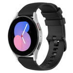 20mm silicone watch band for Samsung Galaxy Watch 5 displayed on a smartwatch with a black strap.